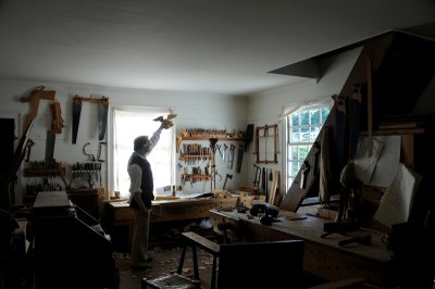 Cabinet Maker in his workshop in Williamsburg