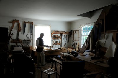 Cabinet Maker in his workshop in Williamsburg
