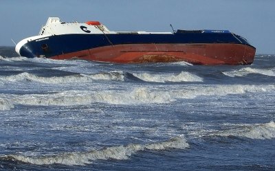 Riverdance Ferry Driven onto Beach approx 2 miles from Blackpool centre and 200 yards from sea wall. Attempts to refloat at time of this photo had been unsuccessful and reports of Cargo on board varied from Scrap metal and Lorries to Goods for Marks and Spencers.
PS
The Riverdance Ferry was never re floated and was eventually broken up and removed from the beach piece by piece.
