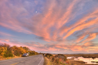 Photographer and Sunset Light on Salt Marsh