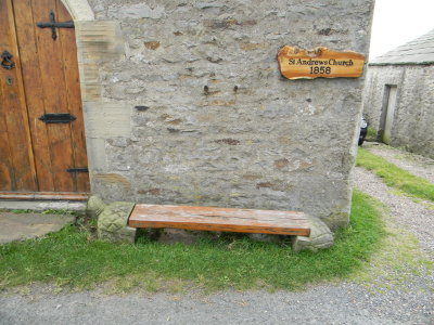 Turtle bench in front of the church at Marrick
