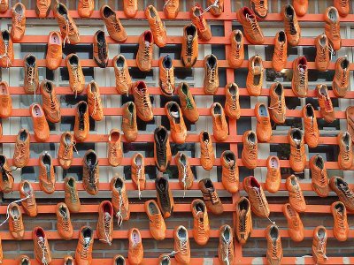 Wall of orange sport shoes