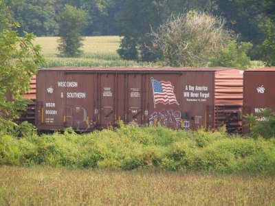 One of Wisconsin & Southern's three boxcars painted to commemorate 9-11. Seen at Porters awaiting pickup by CSX.