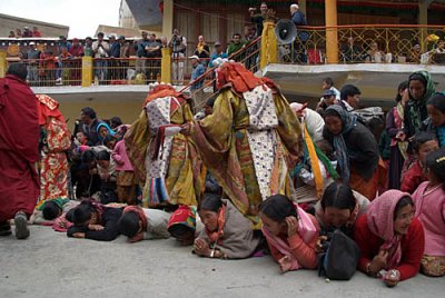 Monks Stepping over Prostrated Devotees 03