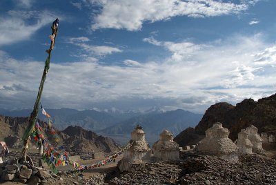 Whitewashed Stupas and Prayer Flags Leh