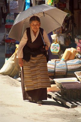 Tibetan Lady in Traditional Dress with Unbrella