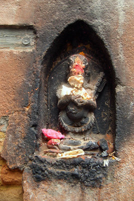 Carving of Kali and Offerings