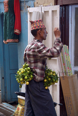 Man Selling Limes and Chillies for Protection