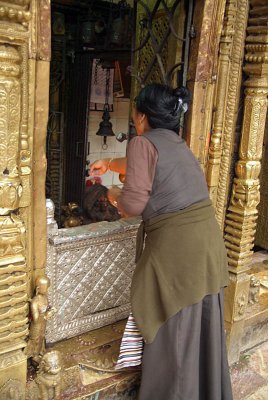 Lady in Tibetan Clothes Making Offering at Janabaha
