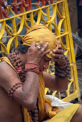 Man Adjusting Costume Gai Jatra Festival