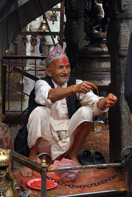 Brahmin Selling Thread Durbar Square