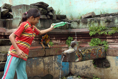 Girl and Hiti Water Spout near Durbar Square