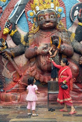 Mother and Children by Kala Bhairab Statue Durbar Square