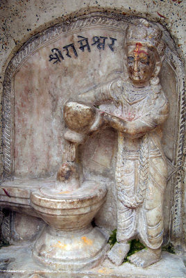 Carved Figure Annointing Shiva Linga