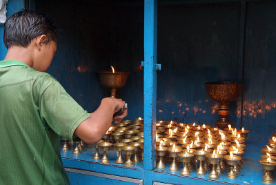 Boy Tending Butter Lamps Kathmandu
