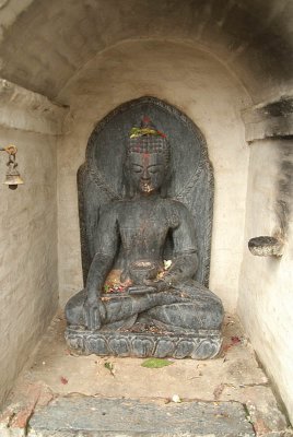 Statue of Buddha with Bell