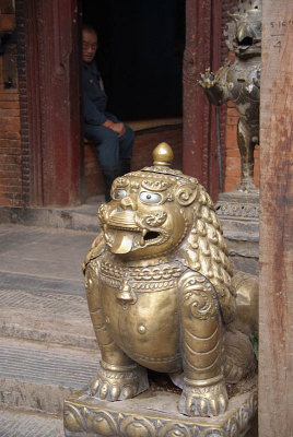 Metal Fu with Guard Behind Golden Temple Patan