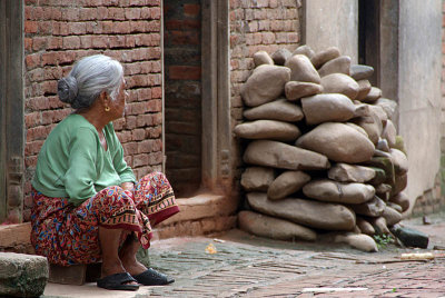 Old Woman Sitting in Street Patan