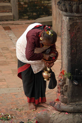 Old Woman Annointing Shrine Bhaktapur