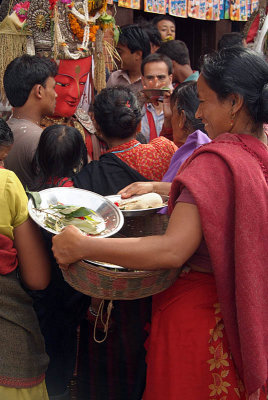 Woman with Offerings and Effegy Pancha Dan 03