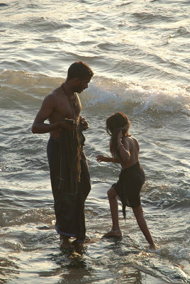 Father and Daughter Enjoying the Sea Kanyakumari