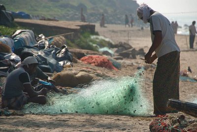 Fishermen Mending Nets Varkala