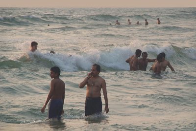 Indian men in the Sea Varkala