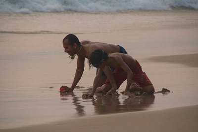 Playing in the Wet Sand Varkala