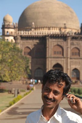 Man on Mobile Phone Gol Gumbaz Bijapur
