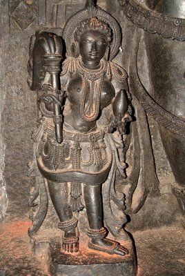 Figure at Foot of Larger Statue Chennakesava Temple Belur 02
