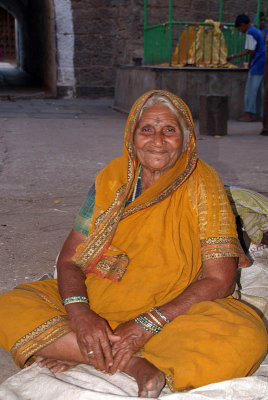 Old Woman in Yellow at Mosque Bijapur