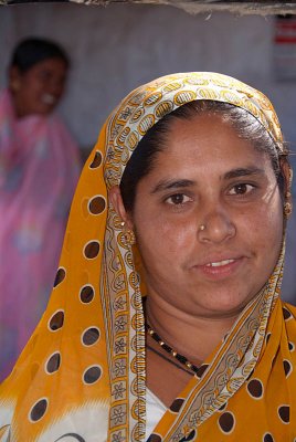 Woman in Yellow Spotted Head Scarf