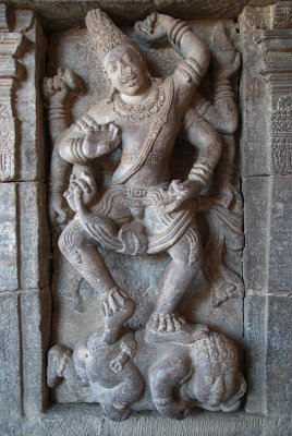 Carved Figure of God Standing on Dwarf Pattadakal Temple
