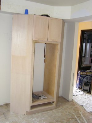This cab will hold the dishwasher and the microwave.  It goes where the new wall meets the sink wall.