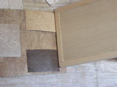 All three flooring choices with the cabinet and the island tile.