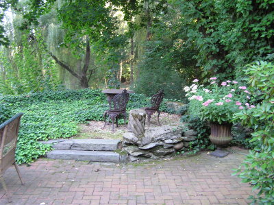 Neighboring rooms little sitting area.