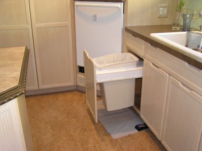 Pull-Out Waste Can with Shock Mat to Keep Casey Out