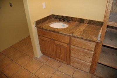 The guest bath is tiled...