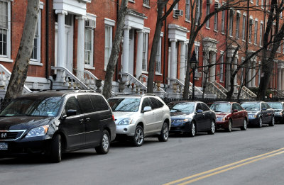 Historic Residences & Mostly NYU Real Estate with Parked Cars