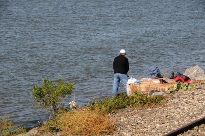 Hudson River Fishermen by the Train Station Tracks