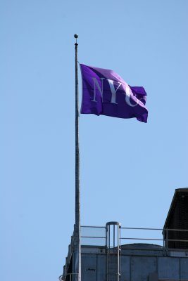 NYU Flag on Top of the Main Building