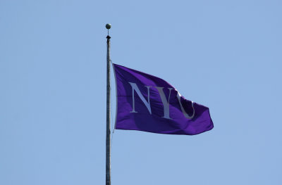 NYU Flag on Top of the Main Building