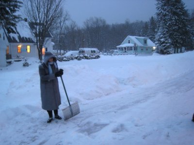 Jeanne in driveway shoveling