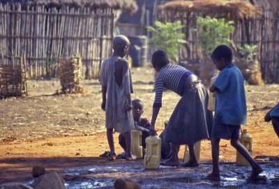 Kids at water well