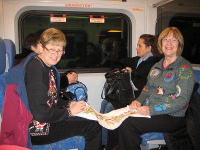 Margaret & Jane like to cross stitch on train