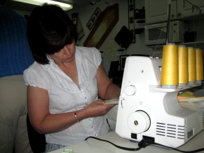 Concentrating on sewing on the edging