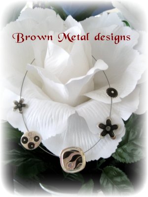 15. Brown Metal disks necklace