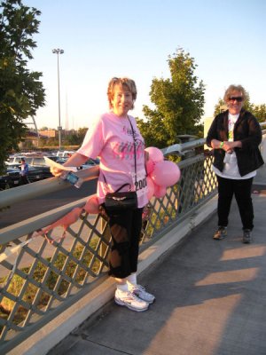 A line of old bras decorated the pedestrian bridge leading to the Race site.