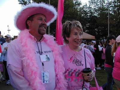 His shirt says Real Men Wear Pink