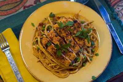 Broiled Salmon with Sweet Pea, Sun-Dried Tomato, and Lemon Spaghetti